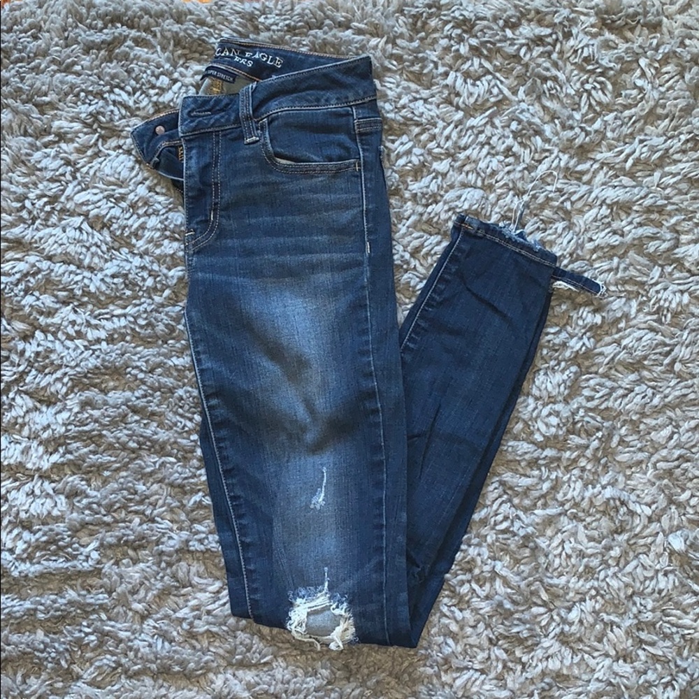 AE BLUE RIPPED JEANS
